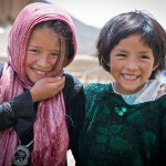 Bamiyan1 BAMYAN PROVINCE, Afghanistan - Two local girls enjoy the Arzu Studio Hope garden and playground in Dragon Valley, west of the town of Bamyan, June 20, 2012. Women enrolled the Arzu program receive higher-than average compensation for their work as rug weavers, and are required to attend literacy classes. They also have access to day care for their children, hot water to wash clothes, a kitchen, and a garden where they can grow their own vegetables and herbs. Younger children attend classes before and after weaving the rugs. (U.S. Army photo by Sgt. Ken Scar, 7th Mobile Public Affairs Detachment) - published in Bamyan Province emerges as a model for Afghanistan’s potential by rceast