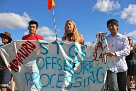 Mohammad Baqiri at a rally PHOTO Mohammad (left) with others at a rally against offshore processing for asylum seekers last year in Melbourne.